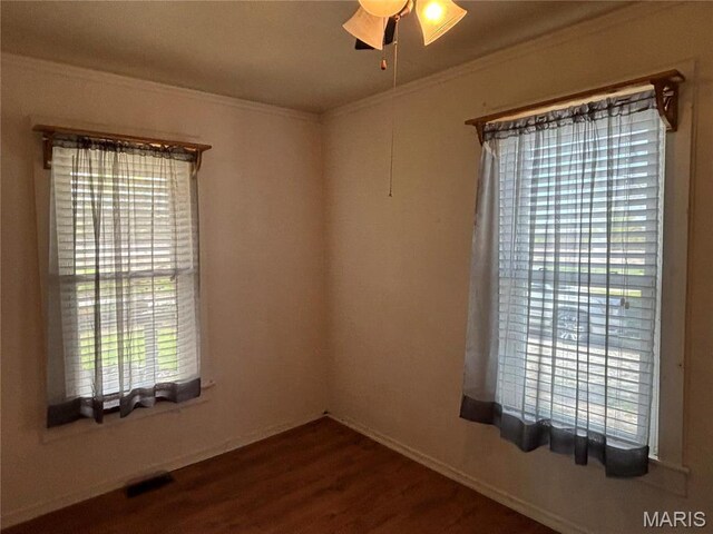 1909 W Springfield Rd, Saint Clair, MO 63077 - empty room featuring ornamental molding, wood finished floors, a ceiling fan, and baseboards