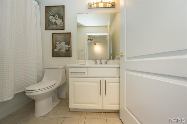 full bathroom featuring tile patterned floors, toilet, vanity, and a shower with shower curtain