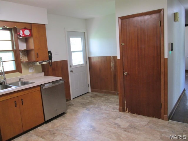 11 W S St, Gerald, MO 63037 - kitchen featuring dishwasher, wainscoting, a sink, light countertops, and plenty of natural light