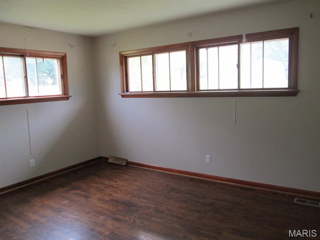 11 W S St, Gerald, MO 63037 - unfurnished room with dark wood-type flooring and baseboards