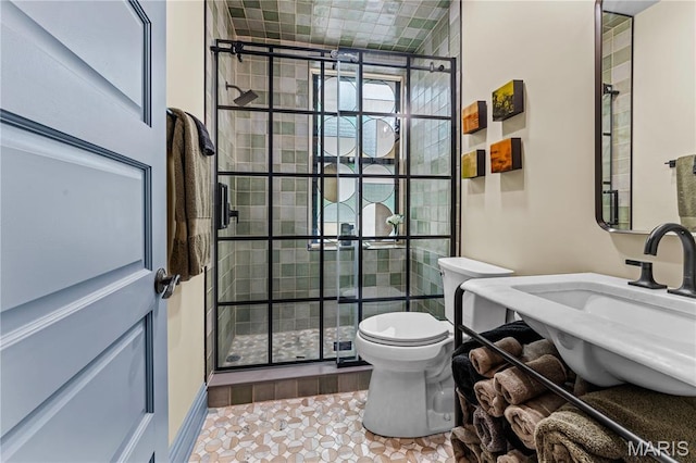 3559 Halliday Ave Unit 102, Saint Louis, MO 63118 - bathroom with a stall shower, toilet, and a sink