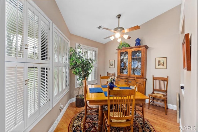 757 Windy Ridge Dr Unit B, Ballwin, MO 63021 - dining room with a ceiling fan, light wood-style floors, and baseboards