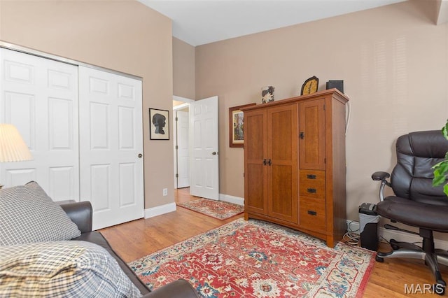 757 Windy Ridge Dr Unit B, Ballwin, MO 63021 - living area featuring light wood-style floors and baseboards