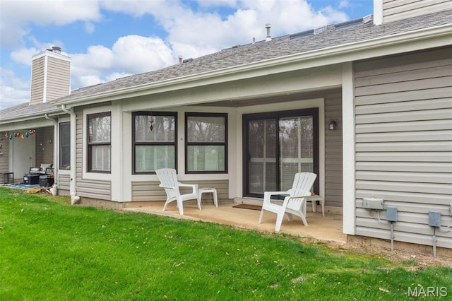 757 Windy Ridge Dr Unit B, Ballwin, MO 63021 - rear view of property with a lawn, a chimney, and a shingled roof