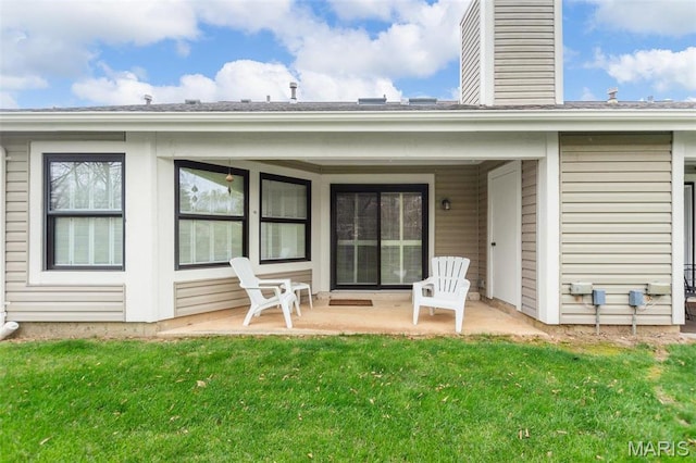 757 Windy Ridge Dr Unit B, Ballwin, MO 63021 - rear view of property featuring a lawn and a chimney