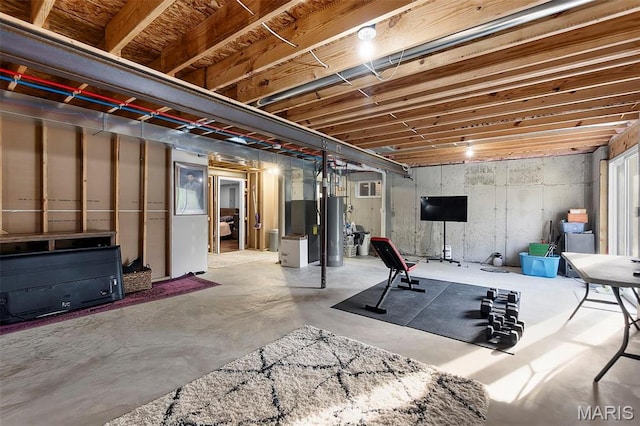 111 Hammond Dr, Herculaneum, MO 63048 - workout room with water heater and heating unit