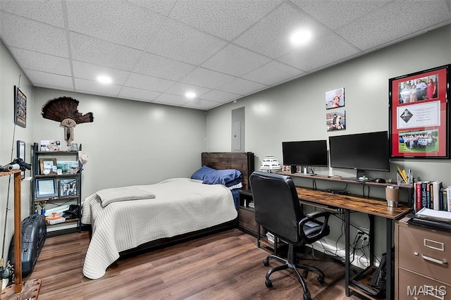 111 Hammond Dr, Herculaneum, MO 63048 - bedroom with wood finished floors, a paneled ceiling, recessed lighting, and a desk