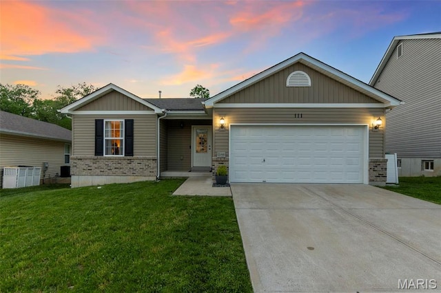111 Hammond Dr, Herculaneum, MO 63048 - ranch-style house featuring driveway, an attached garage, a front yard, and central AC
