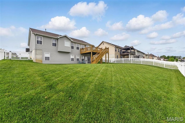 23 Austin Oaks Dr, Moscow Mills, MO 63362 - back of property with stairs, a deck, and a fenced backyard
