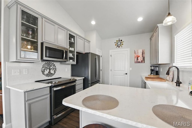 23 Austin Oaks Dr, Moscow Mills, MO 63362 - kitchen featuring gray cabinets, stainless steel appliances, glass insert cabinets, tasteful backsplash, and recessed lighting