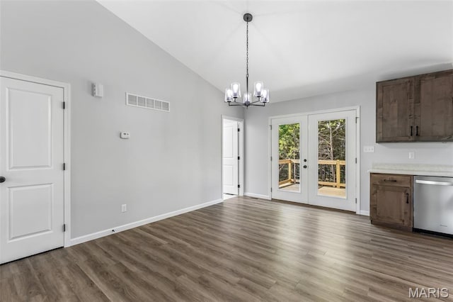 943 Stone Gate Dr, De Soto, MO 63020 - unfurnished dining area featuring french doors, dark wood-style floors, a chandelier, baseboards, and high vaulted ceiling