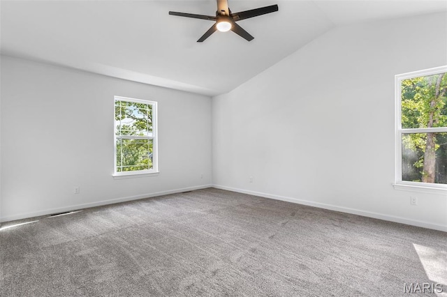 943 Stone Gate Dr, De Soto, MO 63020 - unfurnished room featuring ceiling fan, lofted ceiling, carpet floors, and baseboards