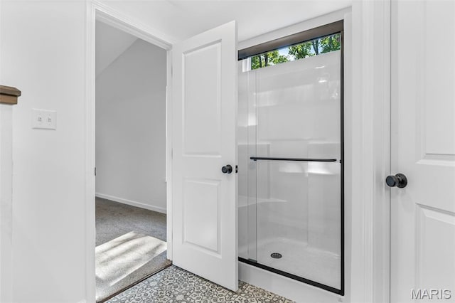 943 Stone Gate Dr, De Soto, MO 63020 - bathroom featuring a shower and baseboards