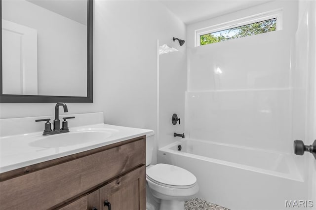 943 Stone Gate Dr, De Soto, MO 63020 - bathroom with vanity, tub / shower combination, and toilet