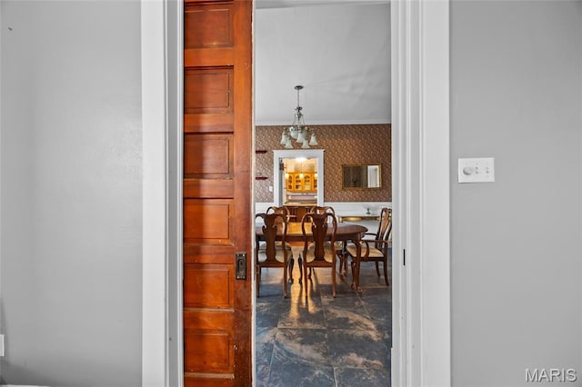 27 N Taylor Ave, Crystal City, MO 63019 - dining room featuring wallpapered walls and ornamental molding