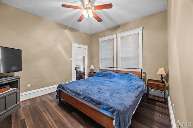 27 N Taylor Ave, Crystal City, MO 63019 - bedroom with baseboards, dark wood finished floors, and a ceiling fan