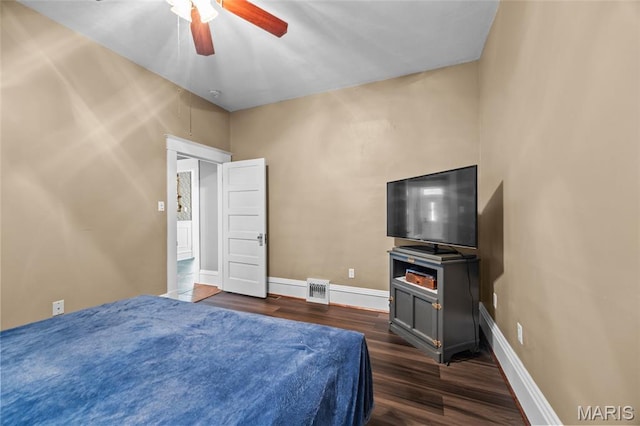 27 N Taylor Ave, Crystal City, MO 63019 - bedroom with dark wood-type flooring, baseboards, and ceiling fan