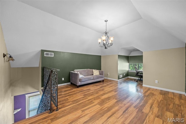 27 N Taylor Ave, Crystal City, MO 63019 - sitting room featuring vaulted ceiling, wood finished floors, baseboards, and a chandelier