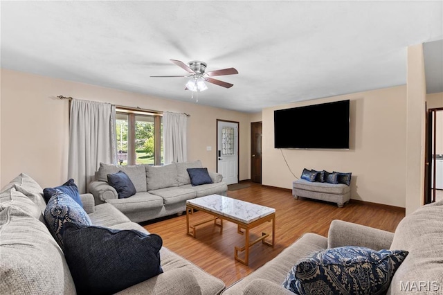 511 Ruddy Ct, Troy, IL 62294 - living room with ceiling fan, wood finished floors, and baseboards