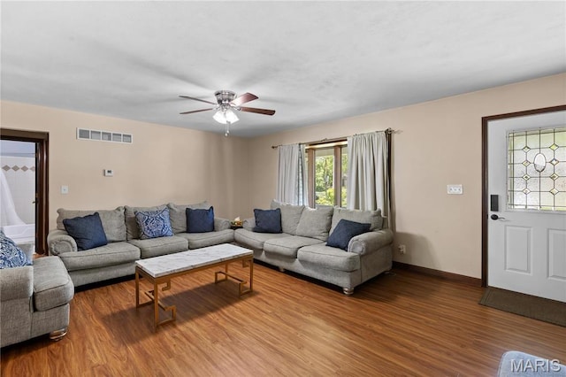 511 Ruddy Ct, Troy, IL 62294 - living area with wood finished floors, a ceiling fan, and baseboards