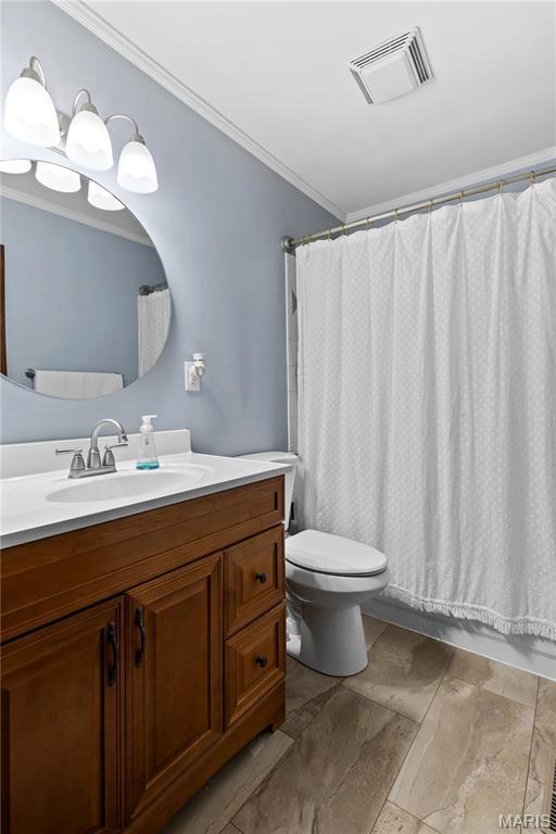 511 Ruddy Ct, Troy, IL 62294 - full bath featuring toilet, vanity, and crown molding