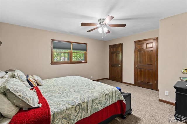 511 Ruddy Ct, Troy, IL 62294 - bedroom with carpet, baseboards, and a ceiling fan