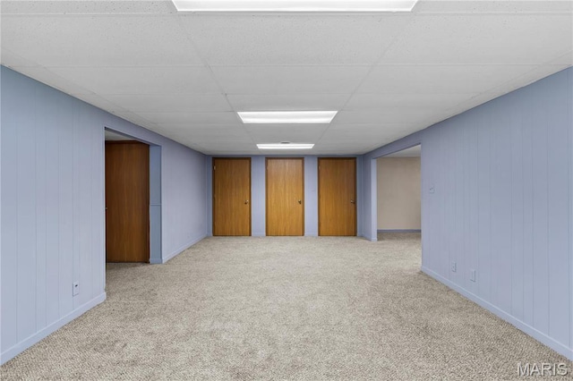 511 Ruddy Ct, Troy, IL 62294 - spare room featuring light carpet, a paneled ceiling, and baseboards
