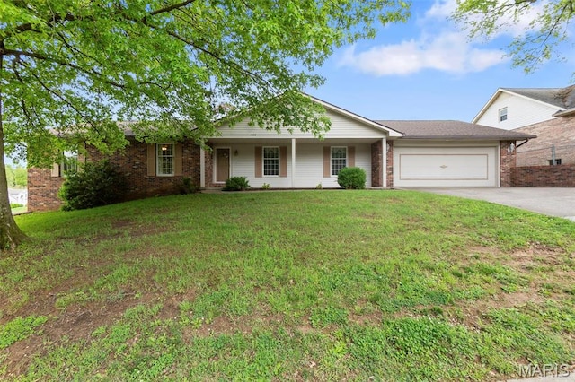 1572 Lexington Ave, Cape Girardeau, MO 63701 - ranch-style house with a front lawn, an attached garage, concrete driveway, brick siding, and a porch