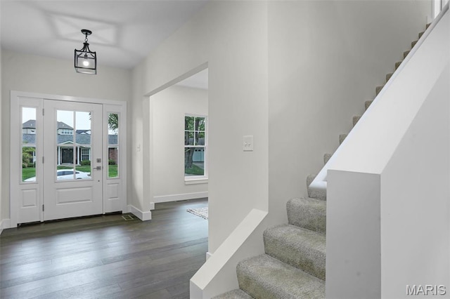 683 Bellerive Estates Dr, Saint Louis, MO 63141 - entrance foyer with stairs, dark wood-style floors, and baseboards