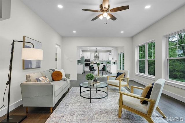 683 Bellerive Estates Dr, Saint Louis, MO 63141 - living room with dark wood-style floors, recessed lighting, ceiling fan, and baseboards