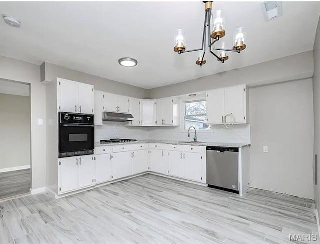 5108 S Gem Dr, High Ridge, MO 63049 - kitchen featuring appliances with stainless steel finishes, light countertops, and white cabinets