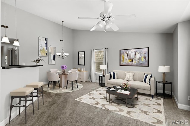 84 Timber Creek Dr Unit 8D, Ofallon, MO 63368 - living area featuring carpet, lofted ceiling, baseboards, ceiling fan, and a chandelier