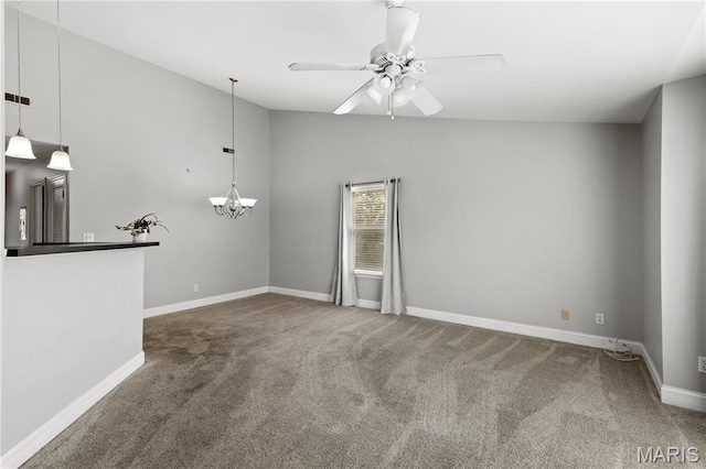 84 Timber Creek Dr Unit 8D, Ofallon, MO 63368 - carpeted empty room featuring a chandelier, baseboards, a ceiling fan, and vaulted ceiling
