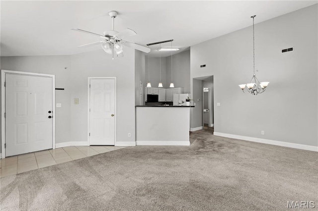 84 Timber Creek Dr Unit 8D, Ofallon, MO 63368 - unfurnished living room with high vaulted ceiling, carpet flooring, a chandelier, a ceiling fan, and baseboards