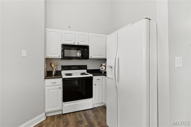 84 Timber Creek Dr Unit 8D, Ofallon, MO 63368 - kitchen with black microwave, range with electric stovetop, white refrigerator with ice dispenser, dark countertops, and white cabinets
