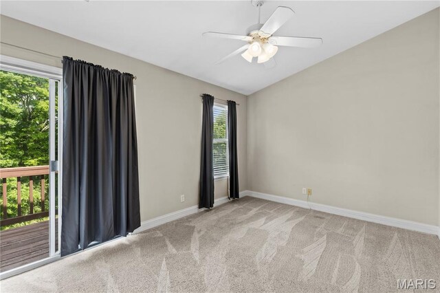 84 Timber Creek Dr Unit 8D, Ofallon, MO 63368 - spare room with carpet floors, vaulted ceiling, baseboards, and a ceiling fan