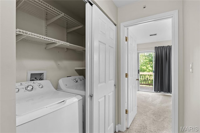 84 Timber Creek Dr Unit 8D, Ofallon, MO 63368 - washroom with washing machine and dryer and carpet flooring