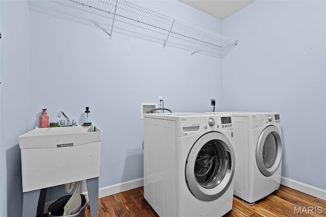 30 Shiloh Ct, Edwardsville, IL 62025 - washroom featuring washing machine and dryer, baseboards, and wood finished floors