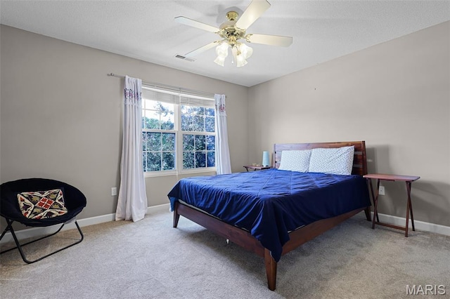 30 Shiloh Ct, Edwardsville, IL 62025 - bedroom with carpet floors, baseboards, ceiling fan, and a textured ceiling