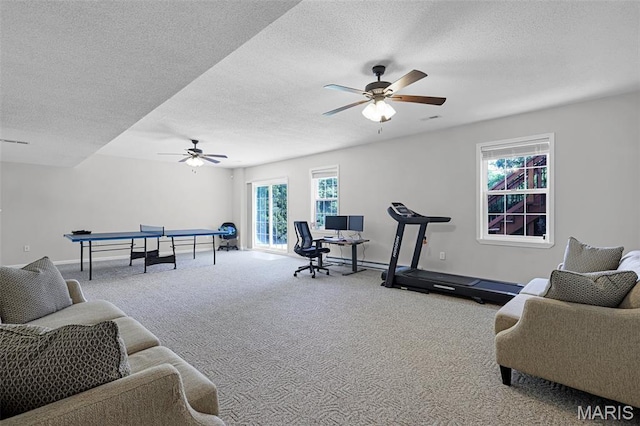 30 Shiloh Ct, Edwardsville, IL 62025 - carpeted living room featuring a textured ceiling, ceiling fan, baseboards, and an office area