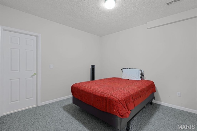30 Shiloh Ct, Edwardsville, IL 62025 - carpeted bedroom featuring a textured ceiling and baseboards