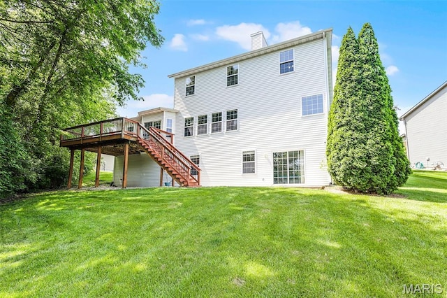 30 Shiloh Ct, Edwardsville, IL 62025 - back of property with stairway, a deck, a chimney, and a yard