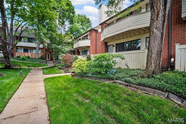 5567 Waterman Blvd Unit D, Saint Louis, MO 63112 - view of property's community featuring a lawn