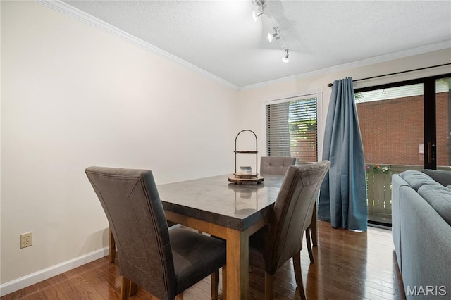 5567 Waterman Blvd Unit D, Saint Louis, MO 63112 - dining space with wood finished floors, ornamental molding, baseboards, and a textured ceiling