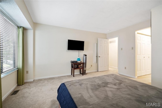 5567 Waterman Blvd Unit D, Saint Louis, MO 63112 - bedroom featuring carpet and baseboards
