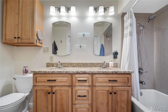 5567 Waterman Blvd Unit D, Saint Louis, MO 63112 - bathroom featuring toilet, shower / tub combo with curtain, and double vanity