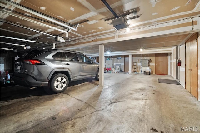 5567 Waterman Blvd Unit D, Saint Louis, MO 63112 - garage with a garage door opener