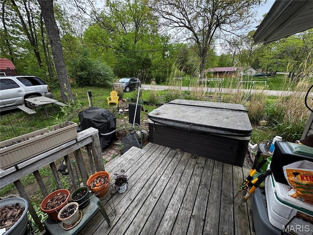 895 Parkway Dr, Bismarck, MO 63624 - deck featuring a hot tub and view of scattered trees