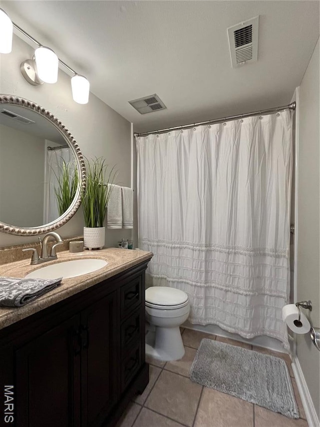 9169 N Swan Cir, Brentwood, MO 63144 - full bathroom with toilet, vanity, tile patterned flooring, and shower / bath combo