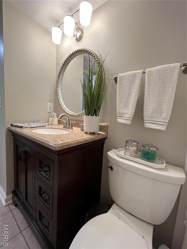 9169 N Swan Cir, Brentwood, MO 63144 - half bath with toilet, vanity, and tile patterned flooring